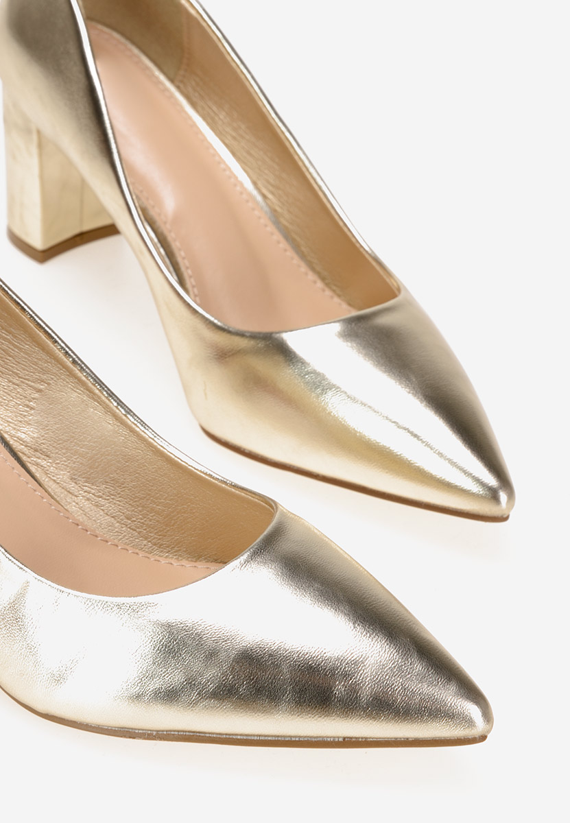 Złote czółenka na słupku Danza