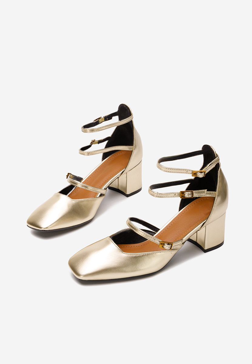 Złote czółenka na słupku Demara V2