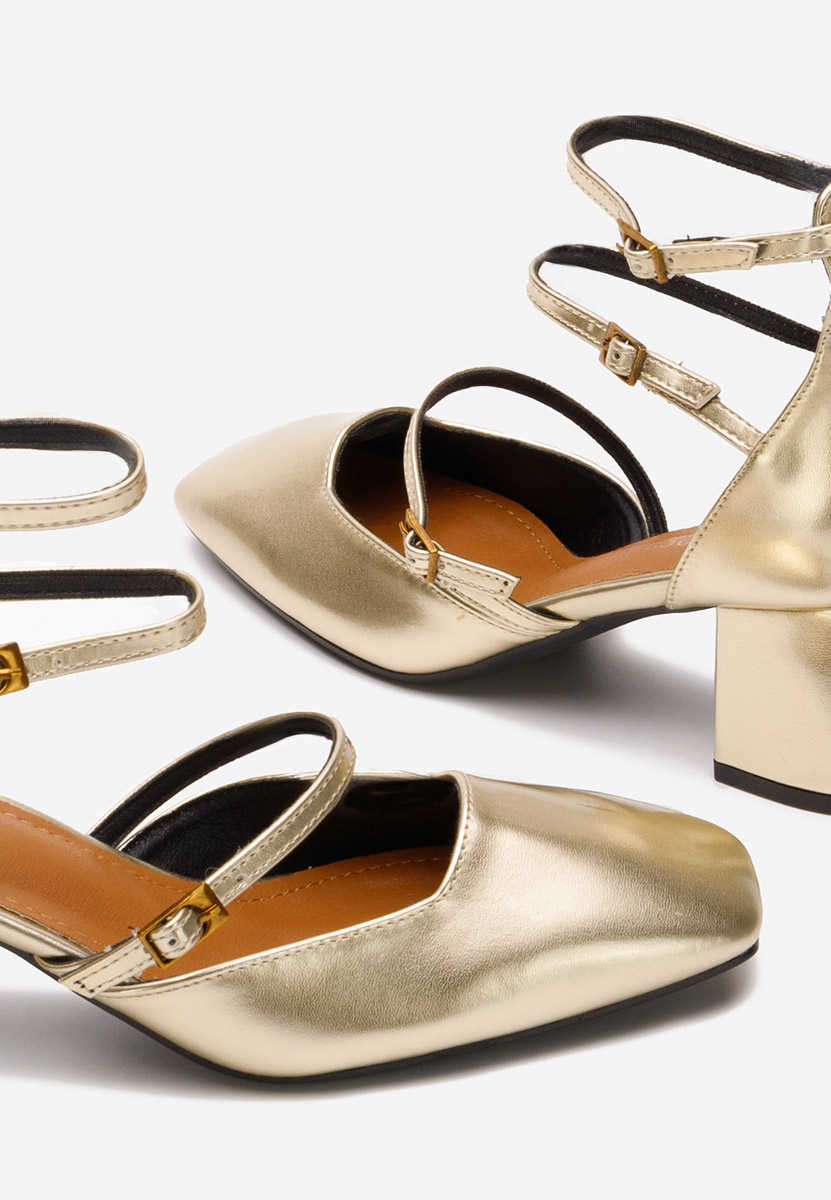 Złote czółenka na słupku Demara V2