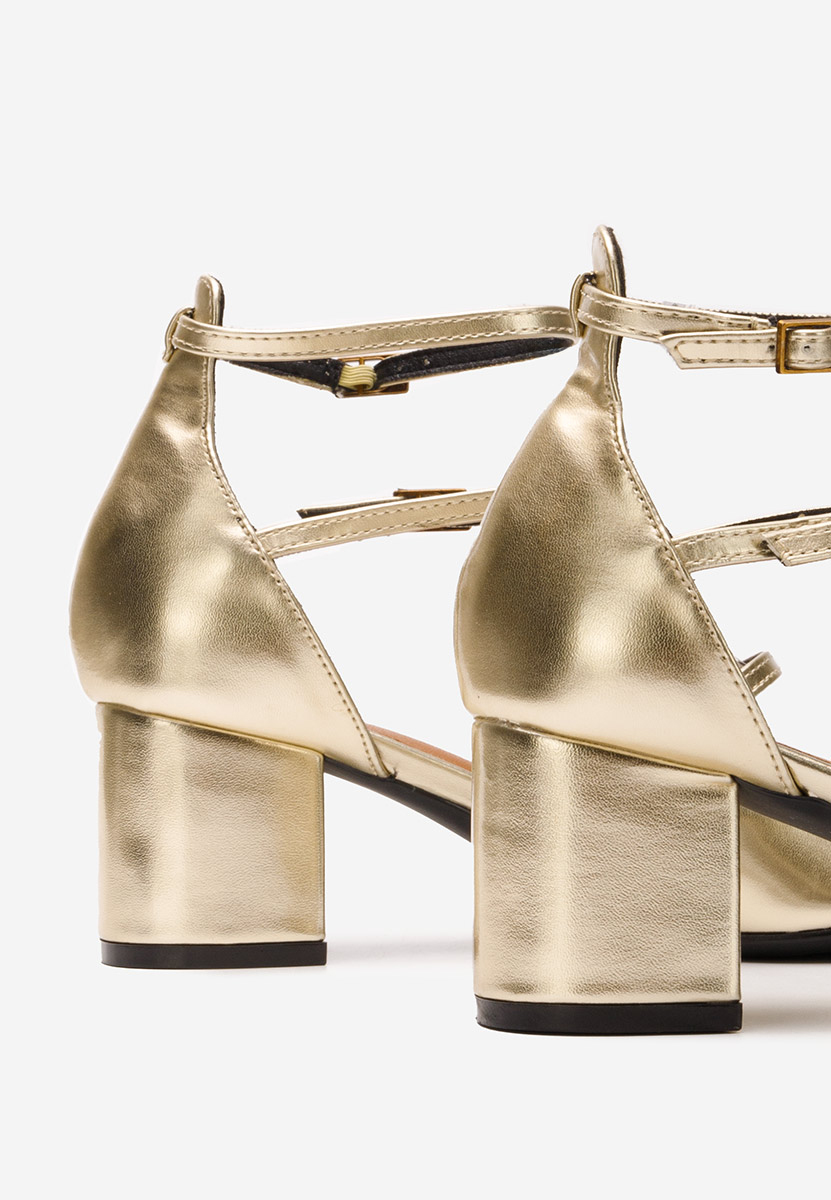 Złote czółenka na słupku Demara V2