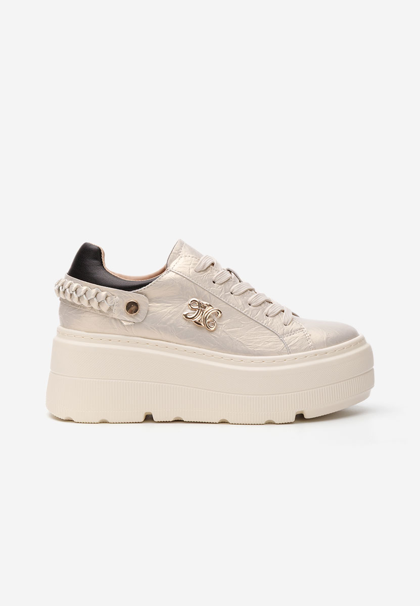 Złote sneakersy na platformie Blanch