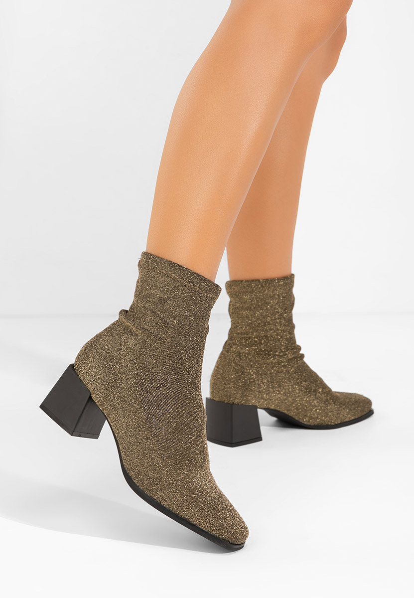 Złote botki na słupku Denonia V2