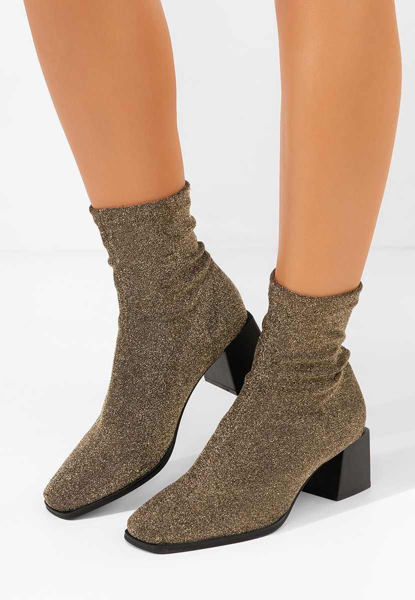 Złote botki na słupku Denonia V2