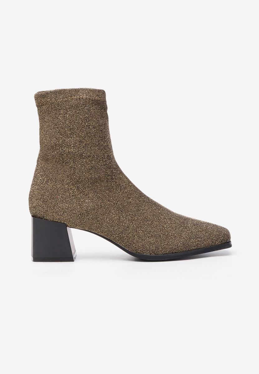 Złote botki na słupku Denonia V2