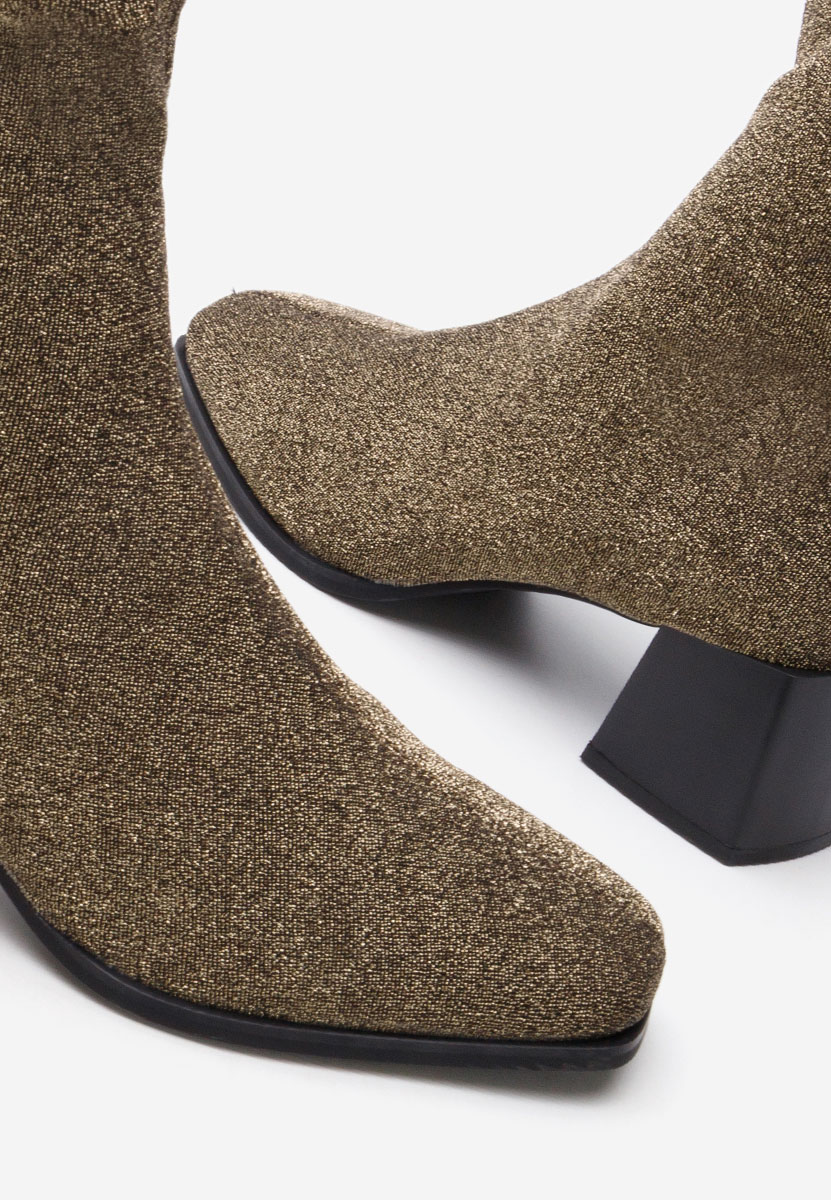 Złote botki na słupku Denonia V2