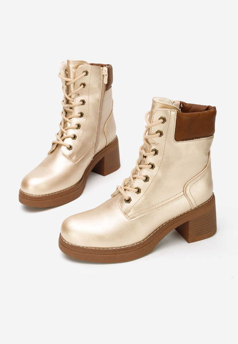 Złote botki na słupku Celoria