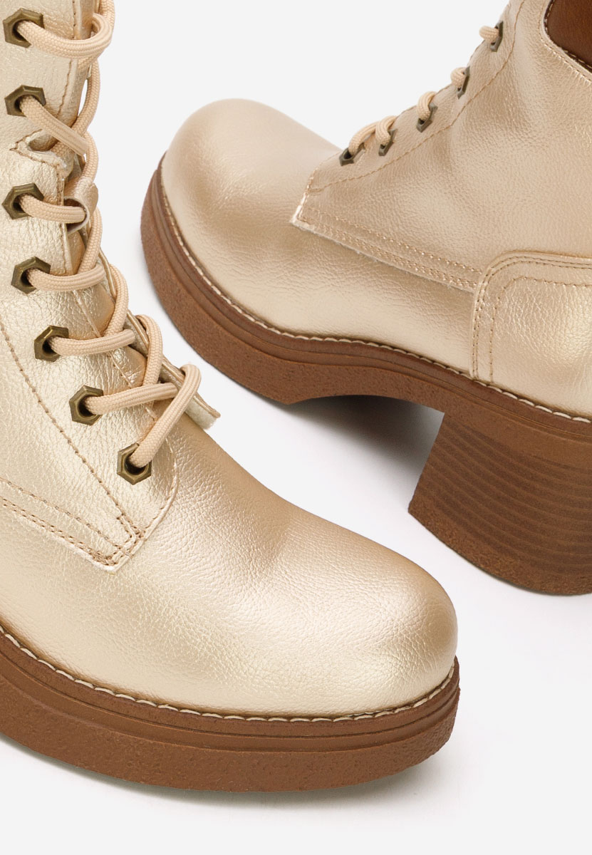 Złote botki na słupku Celoria