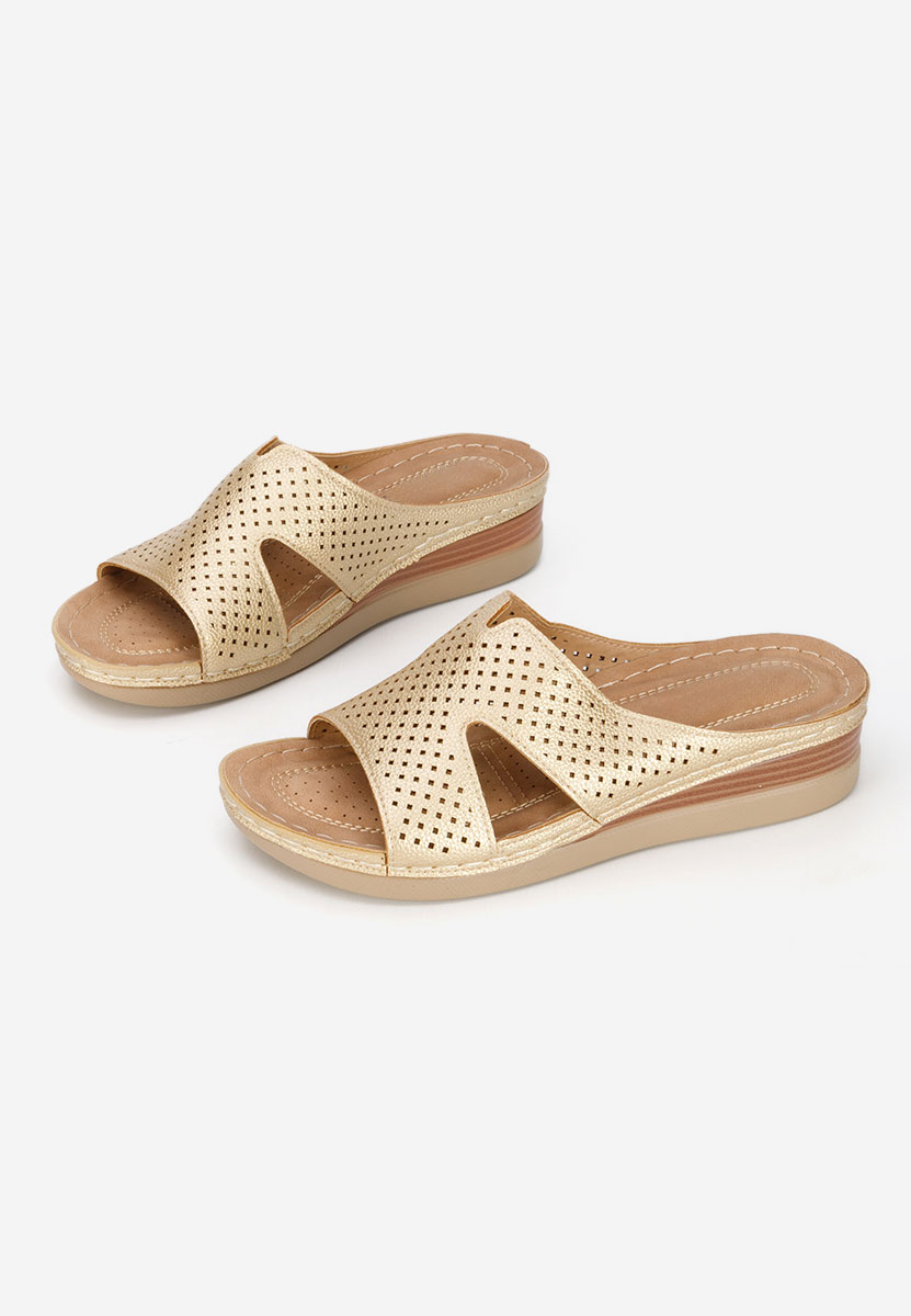 Złote klapki na koturnie Hermana