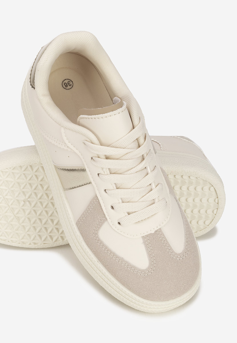 Złote sneakersy na platformie Serinia