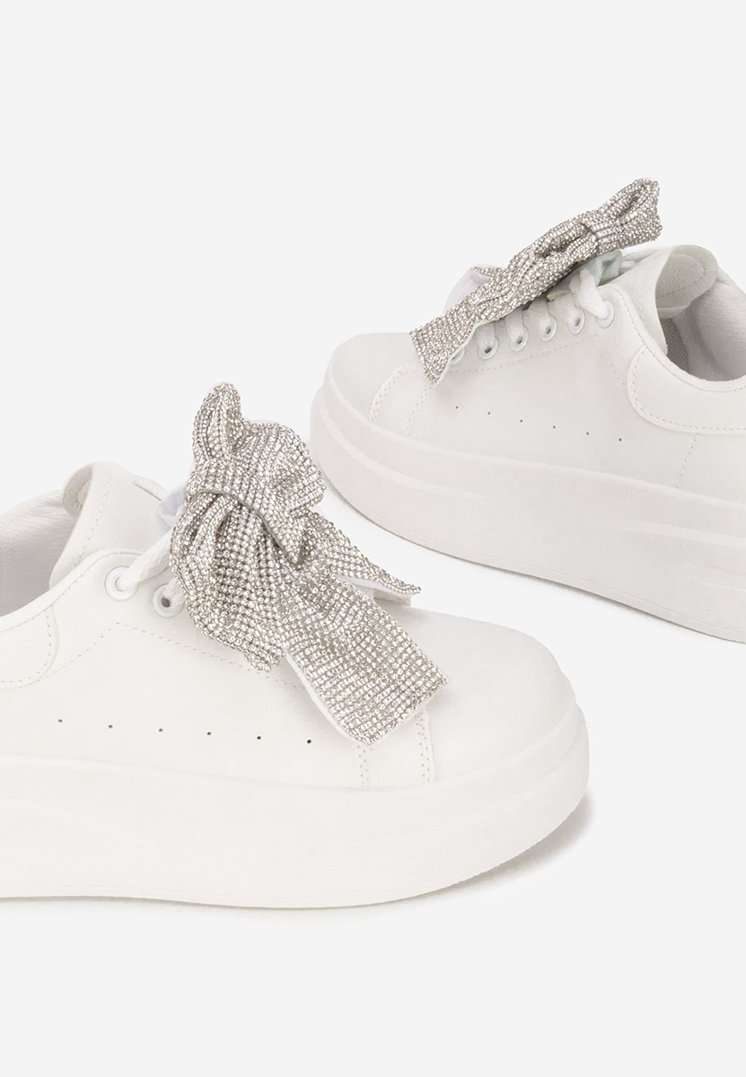 Białe sneakersy na platformie Anitta